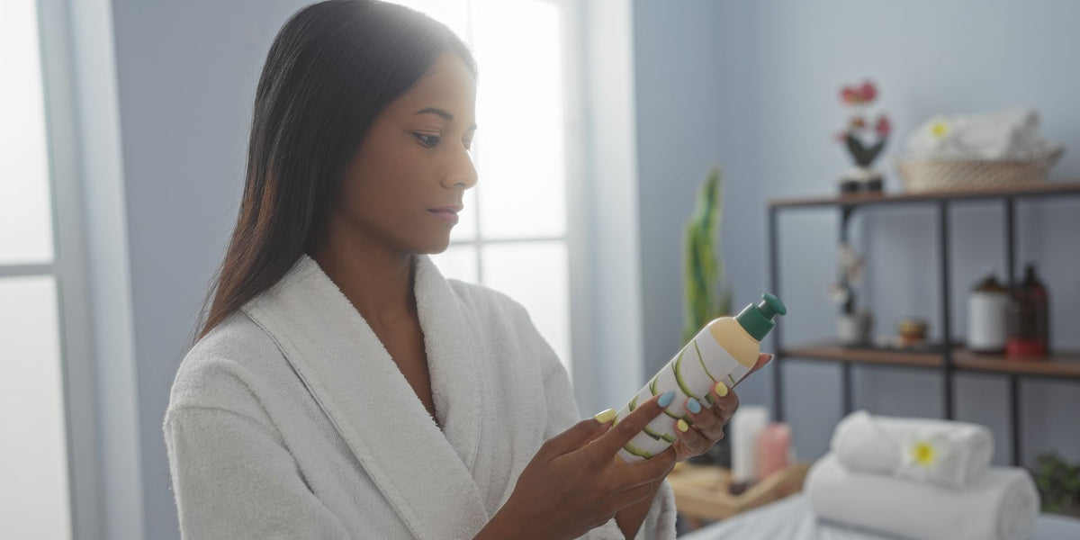 Woman reading skincare product label