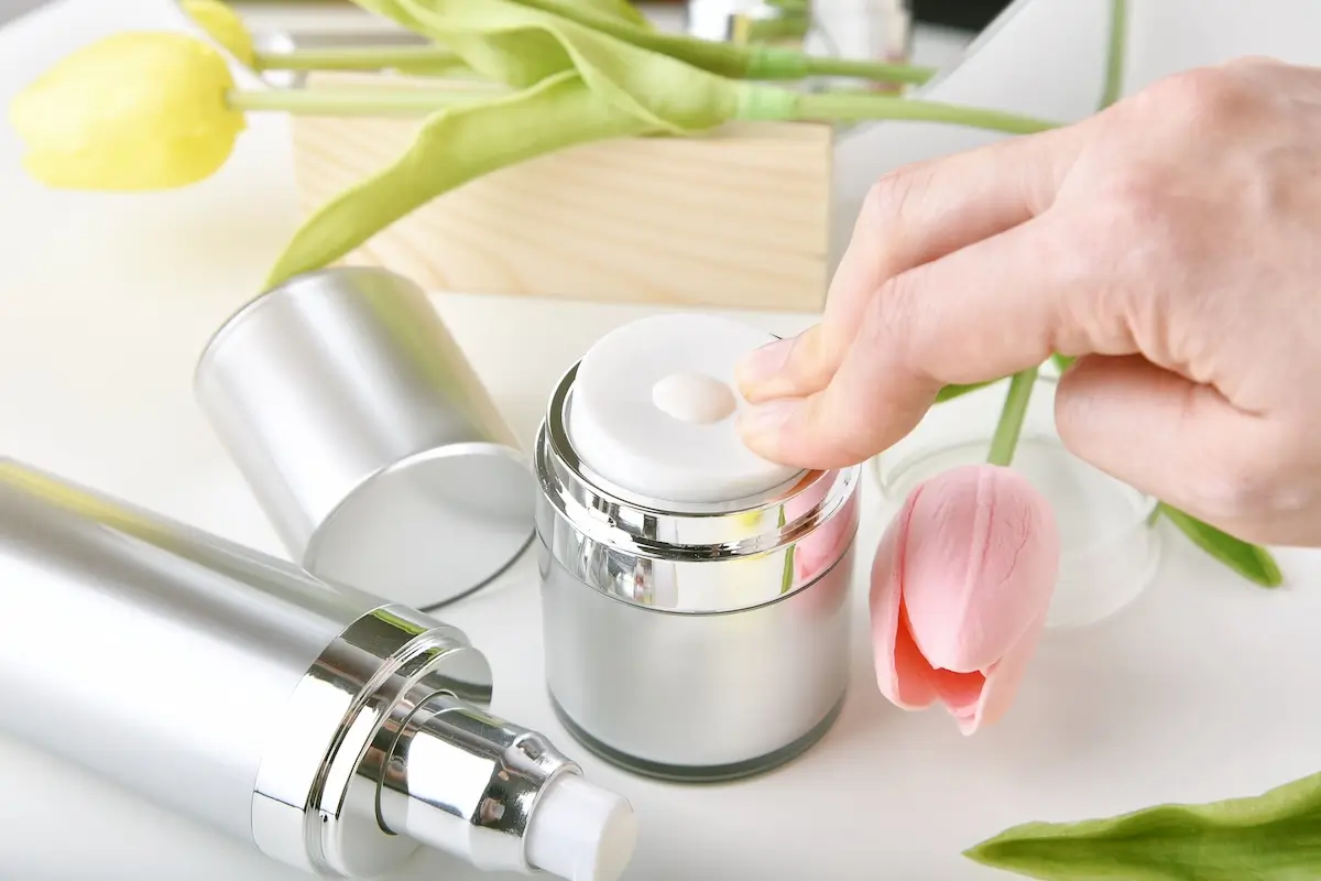 hand pumping natural skincare bottle 2024 11 29 01 31 53 utc