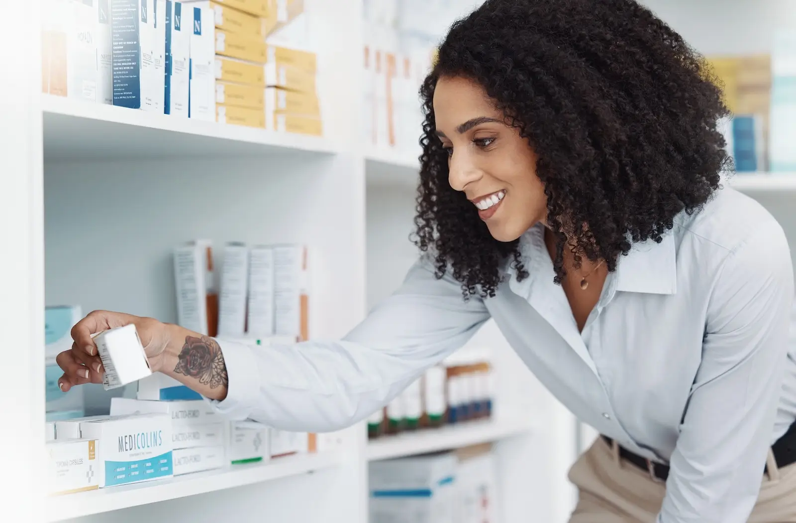pharmacy product and shelf with black woman in st 2025 04 06 07 14 28 utc
