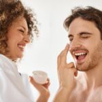 woman applying cream to her man in bathroom and la 2024 11 14 05 55 00 utc